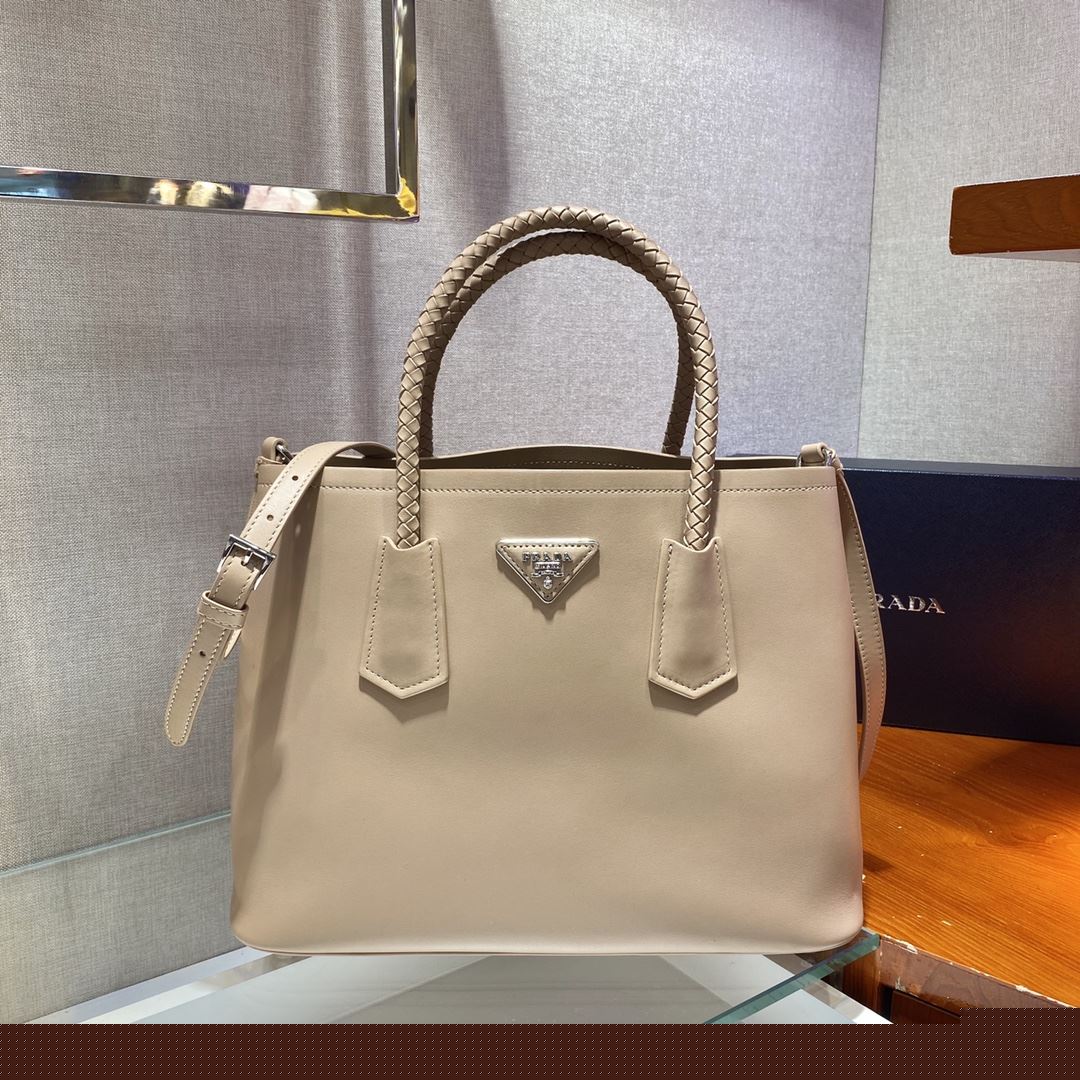 Pra*a top handle bags